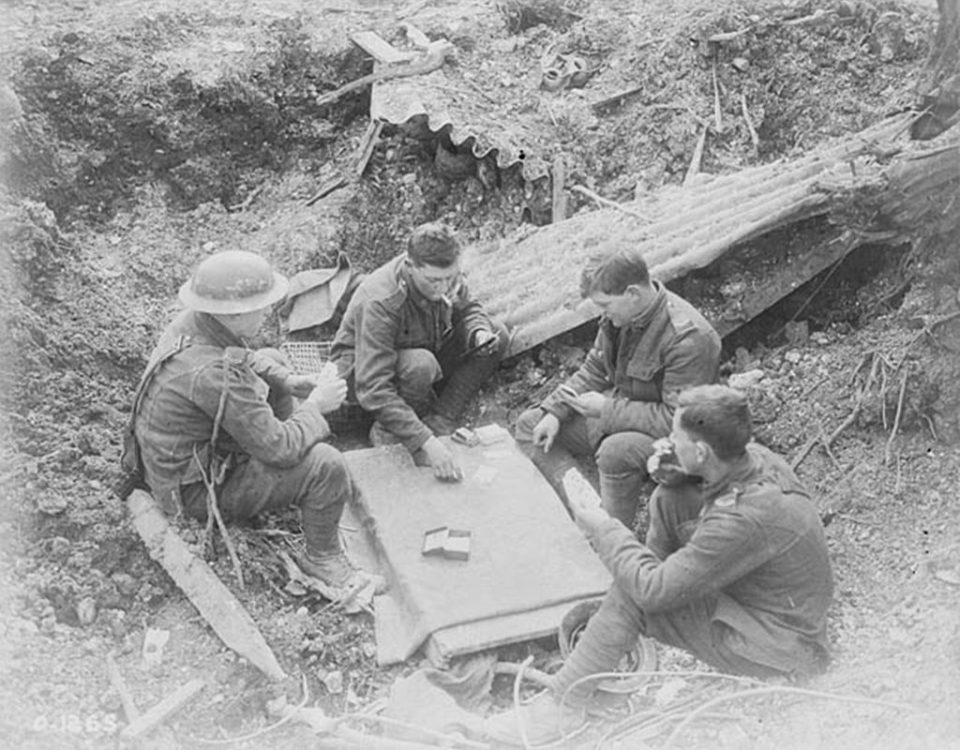 Playing cards in a damaged trench, April 1917 (LAC M#3194322).